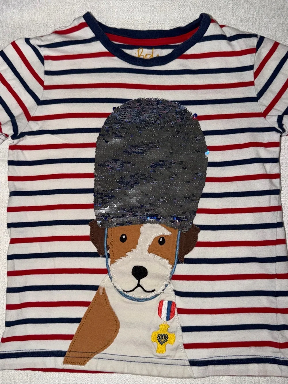 Two Mini Boden appliqué T-shirts, and two pair of shorts size 5/6